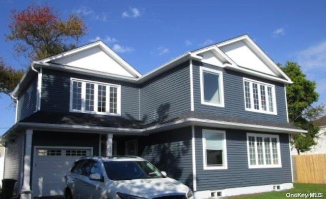 view of property with a garage