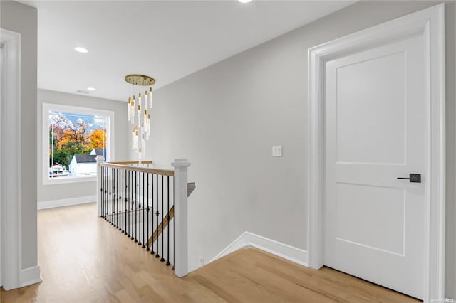 corridor featuring light hardwood / wood-style flooring