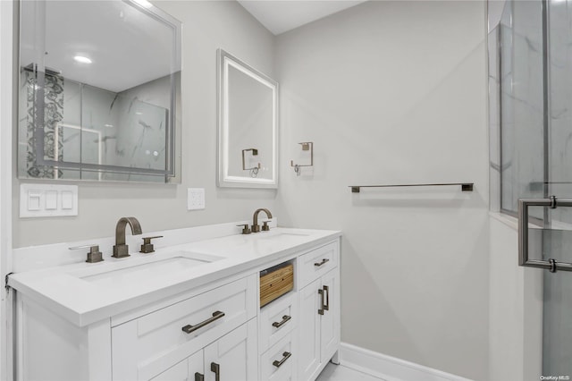 bathroom with vanity and an enclosed shower