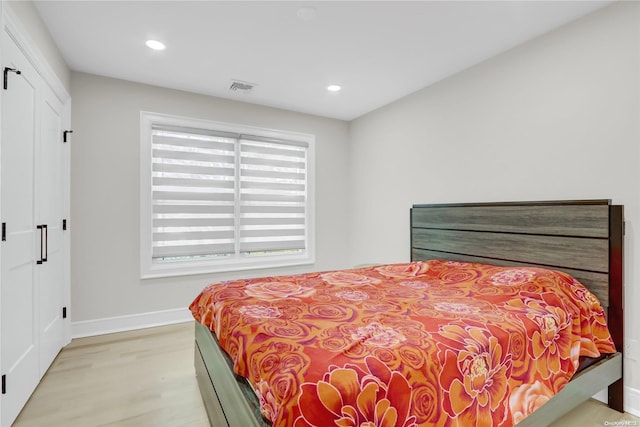 bedroom featuring light hardwood / wood-style floors