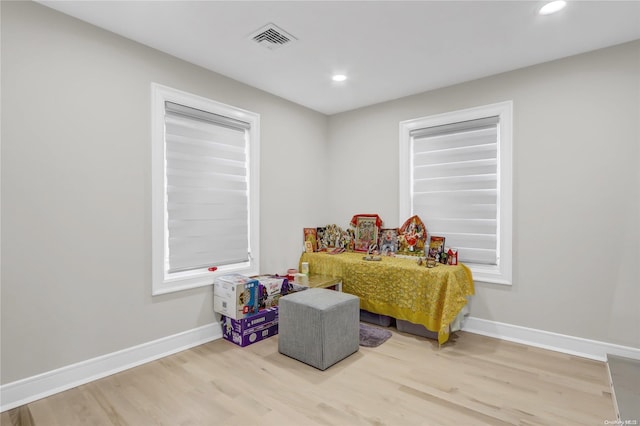 game room featuring light hardwood / wood-style floors