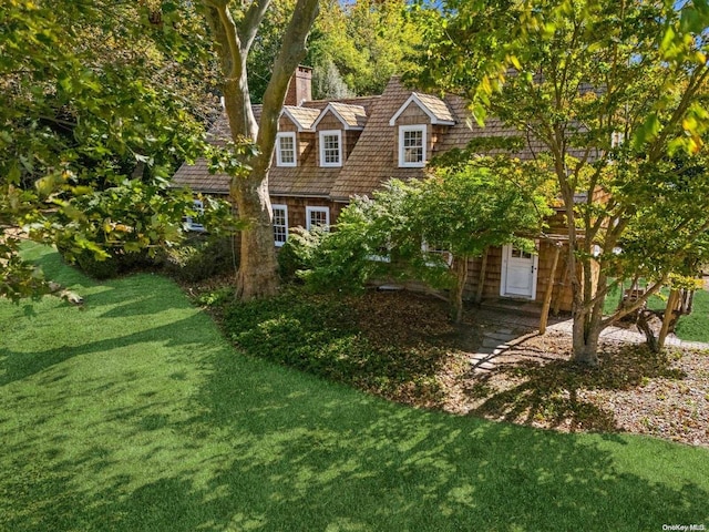 exterior space featuring a front lawn