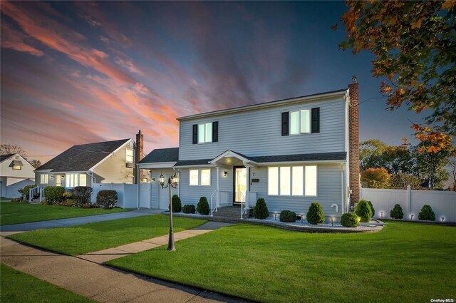 7 Hicks Cir, Hicksville, NY 11801 - view of front of home featuring a yard