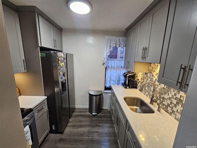 83-85 Woodhaven Blvd Unit 1K, Woodhaven, NY 11421 - kitchen featuring range with gas stovetop, stainless steel refrigerator with ice dispenser, tasteful backsplash, dark wood-type flooring, and light stone counters