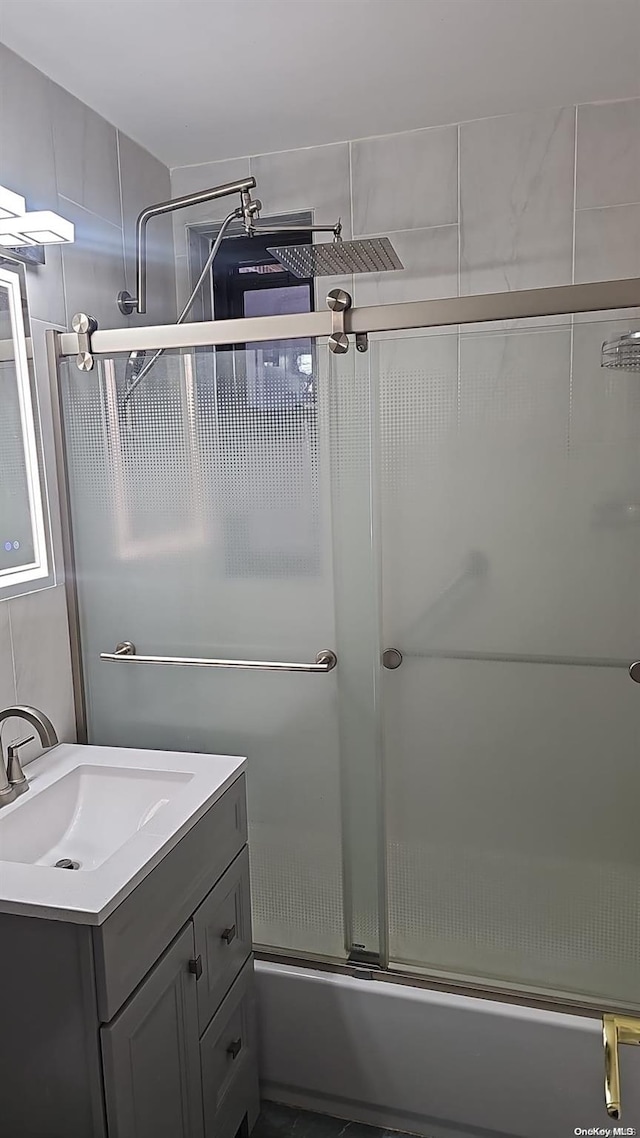 83-85 Woodhaven Blvd Unit 1K, Woodhaven, NY 11421 - bathroom with vanity and bath / shower combo with glass door