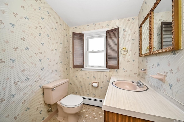 bathroom featuring tile patterned flooring, toilet, vanity, and a baseboard heating unit