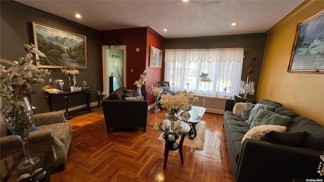 living room with parquet floors and radiator