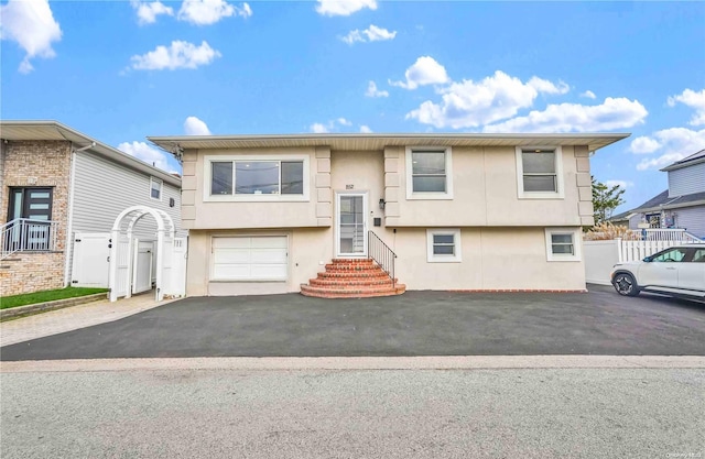 raised ranch with a garage