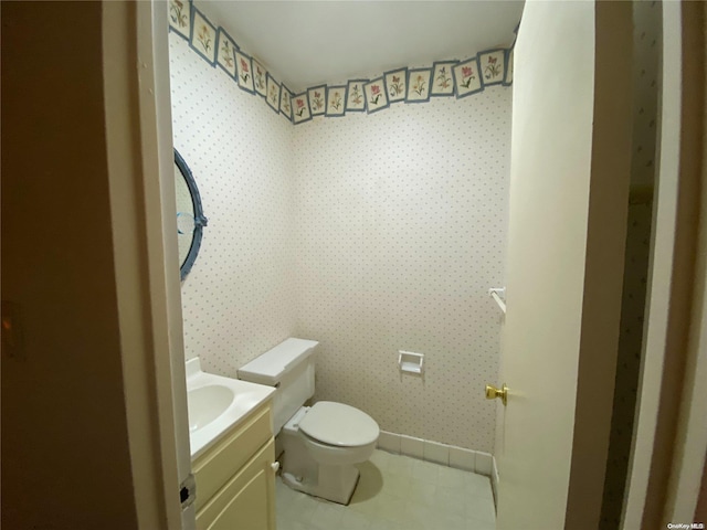 bathroom with vanity and toilet