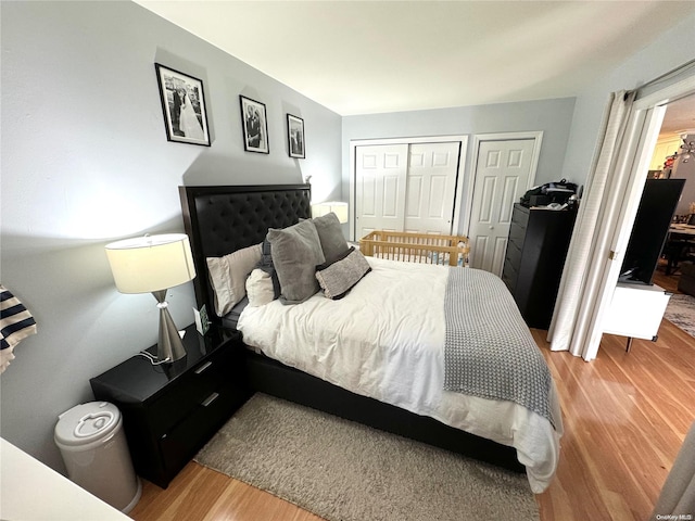 bedroom with light wood-type flooring