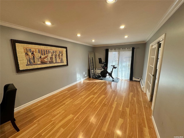 interior space with light hardwood / wood-style floors, ornamental molding, an AC wall unit, and a baseboard heating unit