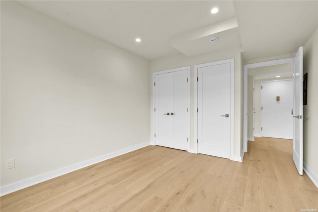 unfurnished bedroom featuring light hardwood / wood-style flooring