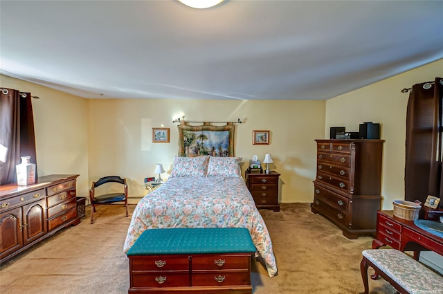 bedroom with light colored carpet