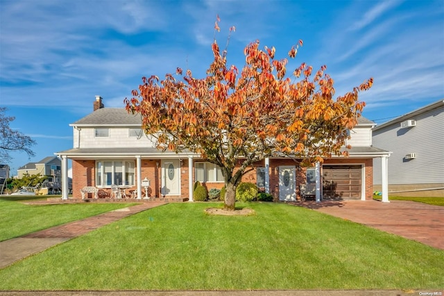 1 Jetmore Pl, Massapequa, NY 11758 - view of front of house featuring brick siding, a front lawn, concrete driveway, and a chimney