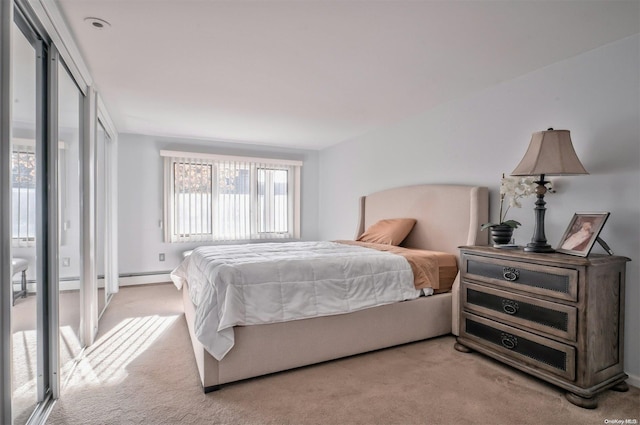 bedroom with light colored carpet