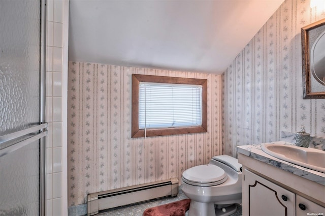 bathroom featuring an enclosed shower, vanity, a baseboard heating unit, toilet, and lofted ceiling