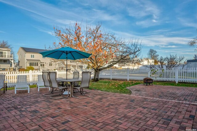 1 Jetmore Pl, Massapequa, NY 11758 - view of patio featuring outdoor dining space and a residential view