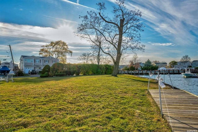1 Jetmore Pl, Massapequa, NY 11758 - view of green lawn featuring a boat dock, a water view, and a residential view