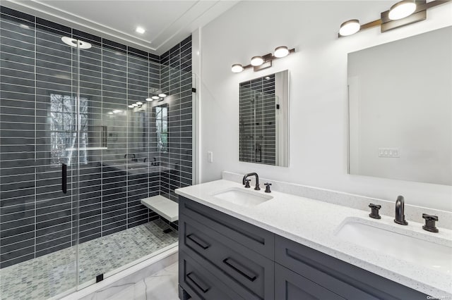 bathroom with vanity and an enclosed shower