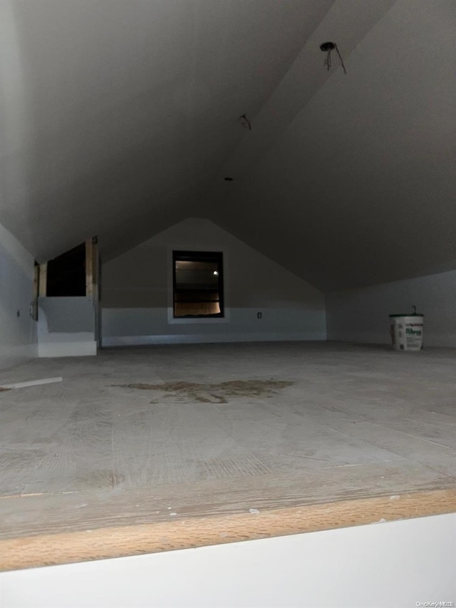 bonus room with vaulted ceiling