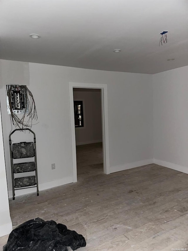 spare room featuring light hardwood / wood-style floors