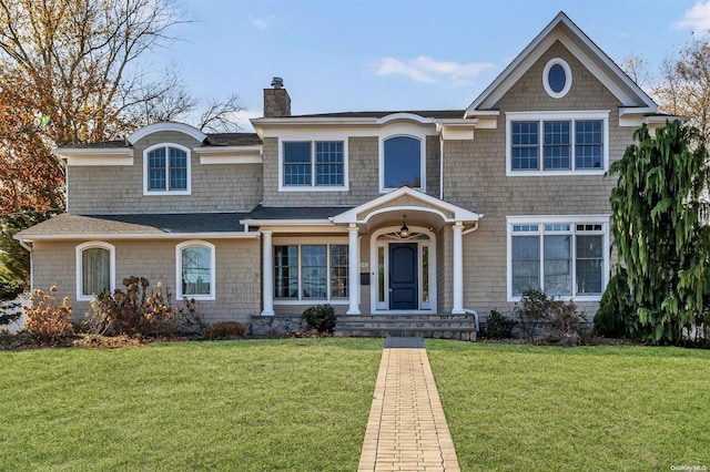 view of front of home with a front yard