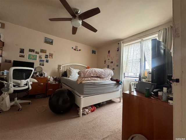 bedroom featuring carpet floors and ceiling fan