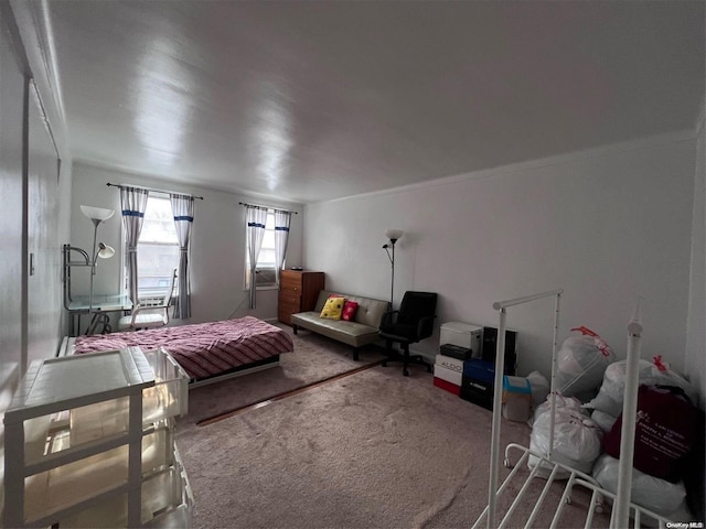 carpeted bedroom with ornamental molding