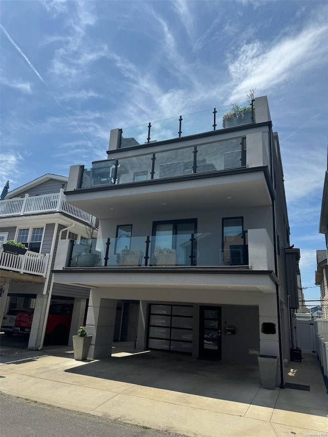 80 Illinois Ave, Long Beach, NY 11561 - view of property featuring an attached garage
