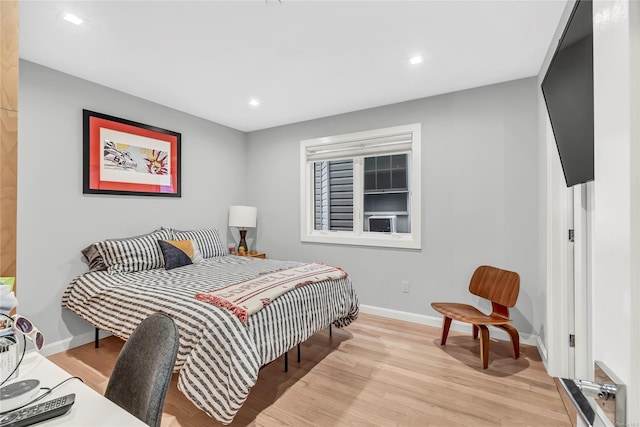 bedroom featuring light hardwood / wood-style floors