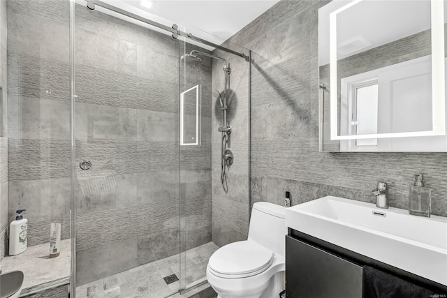 80 Illinois Ave, Long Beach, NY 11561 - bathroom with vanity, tile walls, a stall shower, toilet, and backsplash