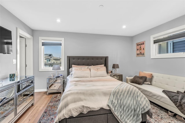 bedroom featuring light hardwood / wood-style floors