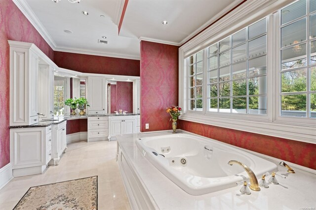 660 Chicken Valley Rd, Matinecock, NY 11560 - bathroom with vanity, a tub with jets, and crown molding