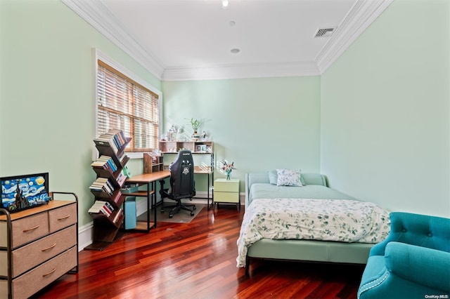 bedroom with crown molding and dark hardwood / wood-style flooring