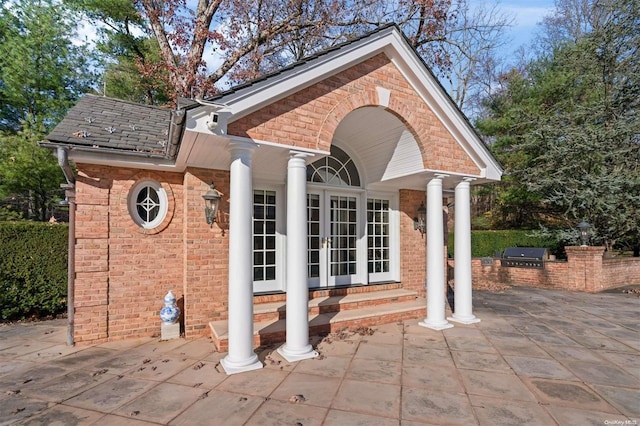 view of patio featuring grilling area and exterior kitchen