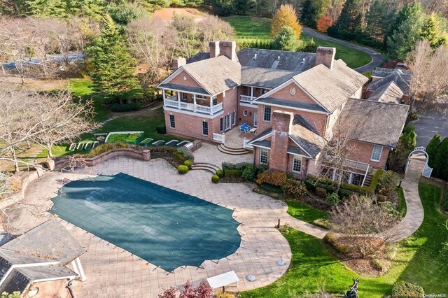 660 Chicken Valley Rd, Matinecock, NY 11560 - view of pool with a patio area and a covered pool