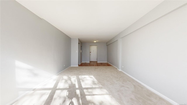 interior space featuring light colored carpet