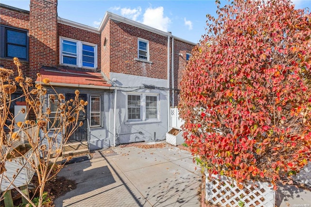 rear view of property with a patio