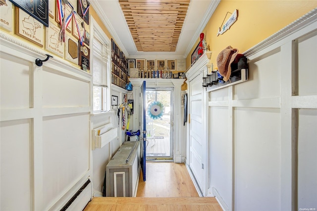 entryway featuring wooden ceiling, light hardwood / wood-style floors, and ornamental molding