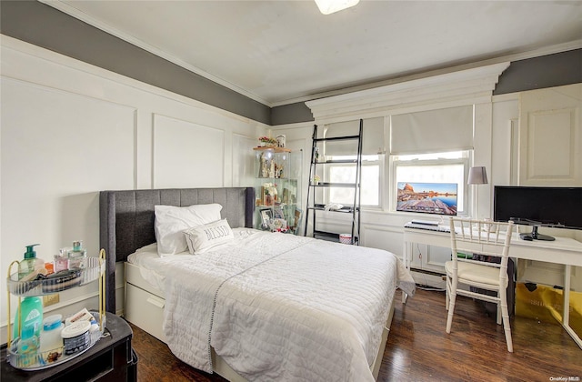 bedroom featuring dark hardwood / wood-style floors and ornamental molding