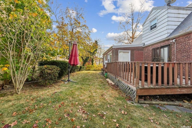 view of yard featuring a deck