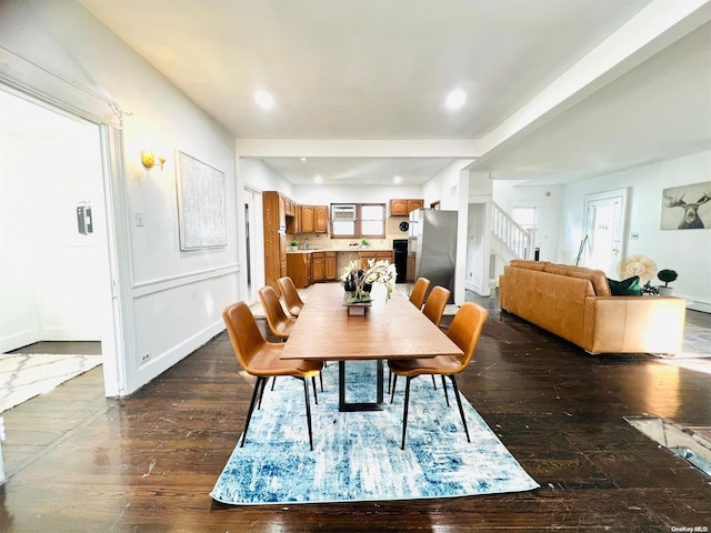 240 Pine St, Freeport, NY 11520 - dining area with sink and dark wood-type flooring
