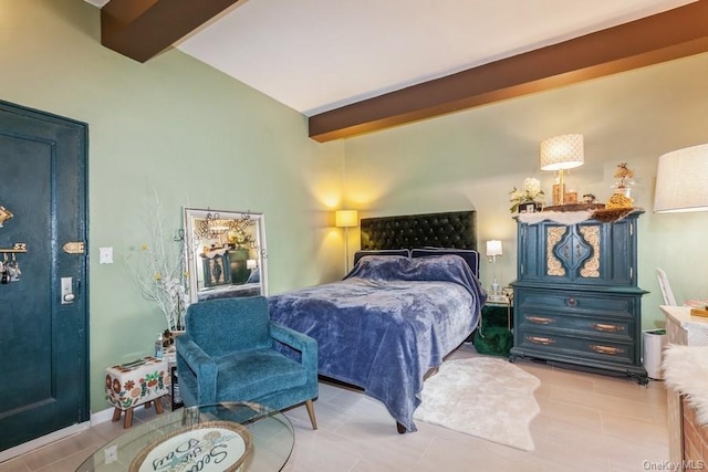 bedroom featuring beam ceiling