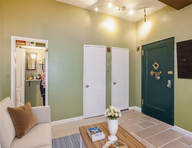 living room with tile patterned flooring