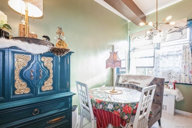 dining room featuring a chandelier