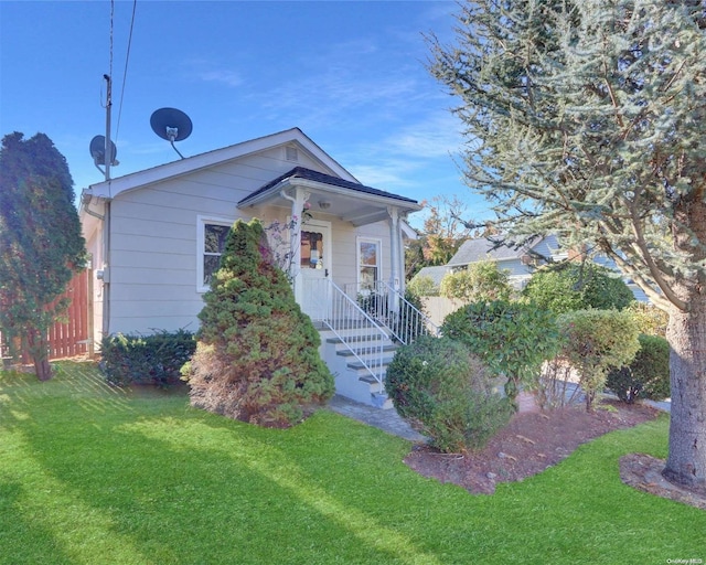 view of front of home with a front yard