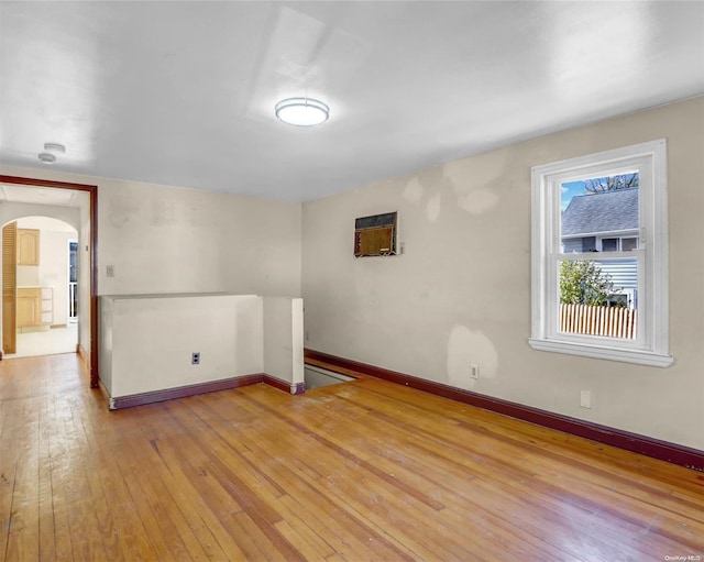 spare room featuring light wood-type flooring