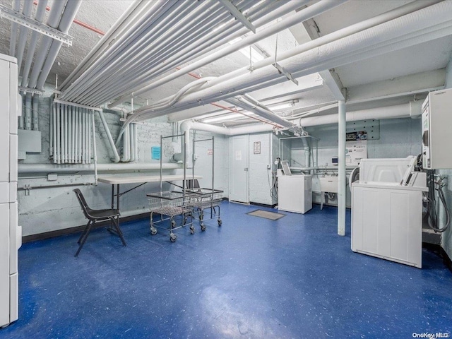 basement featuring sink and independent washer and dryer