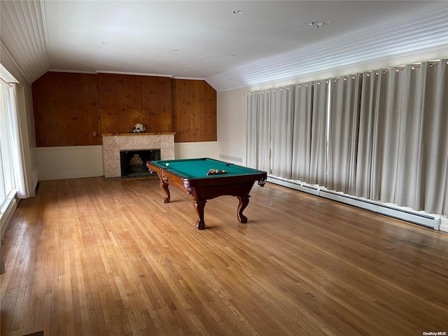 recreation room with hardwood / wood-style flooring, lofted ceiling, billiards, and a baseboard heating unit