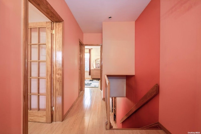 hall with light wood-type flooring